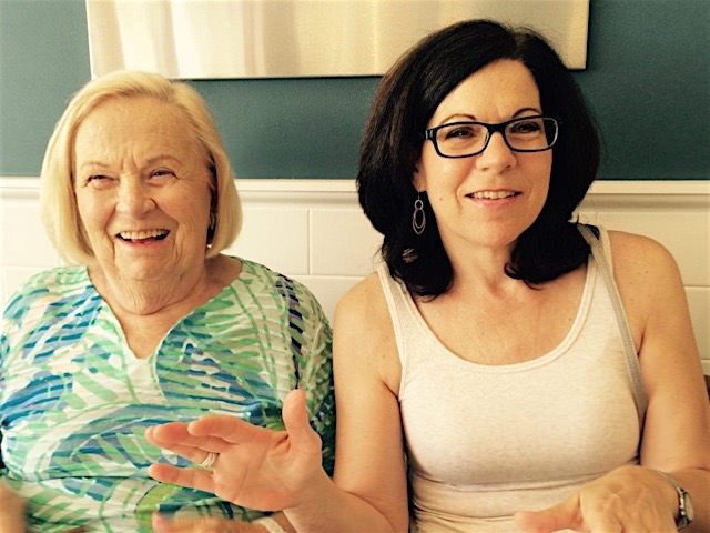 Mom and Nancy laughing at lunch in Palm Beach